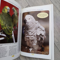 Caring For A Parrot - Teaching A Parrot To Talk (Hardback)